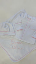 White blanket with pink picot trim